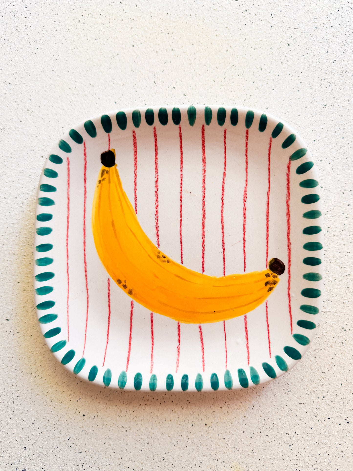 Plato cuadrado platano