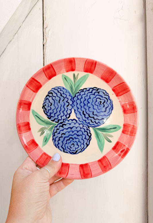 Plato flores borde rosa